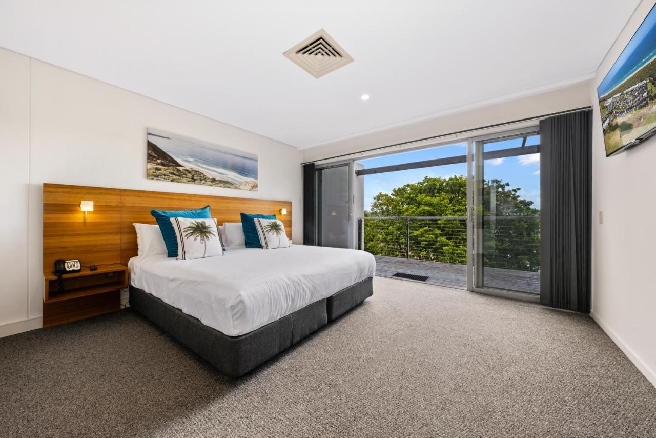 דה אינטרנס Pullman Magenta Shores Resort מראה חיצוני תמונה A bedroom at the hotel