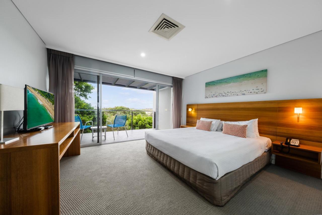 דה אינטרנס Pullman Magenta Shores Resort מראה חיצוני תמונה A bedroom at the Mantra on Saltwater Island